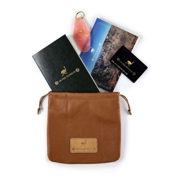Delivered with premium leather pouch, post-card, key ring, notebook and credit card